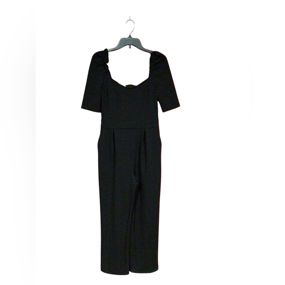Mango black jumpsuit size medium with two pockets and zip up back new with tags!
